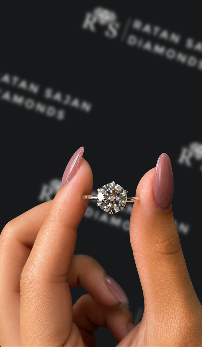 Two carat round brilliant natural diamond solitaire engagement ring