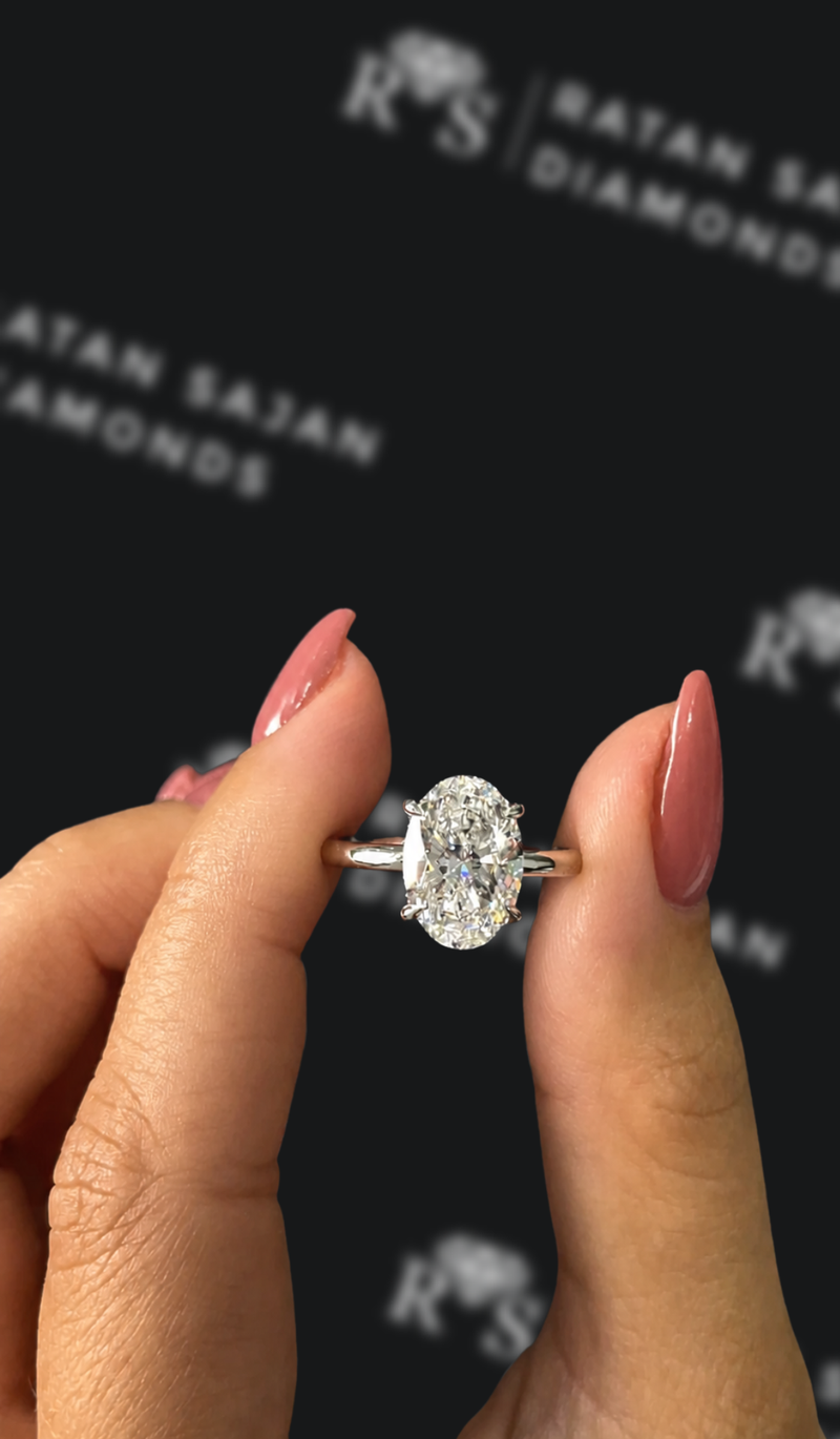 Two-and-a-half carat oval natural diamond solitaire engagement ring