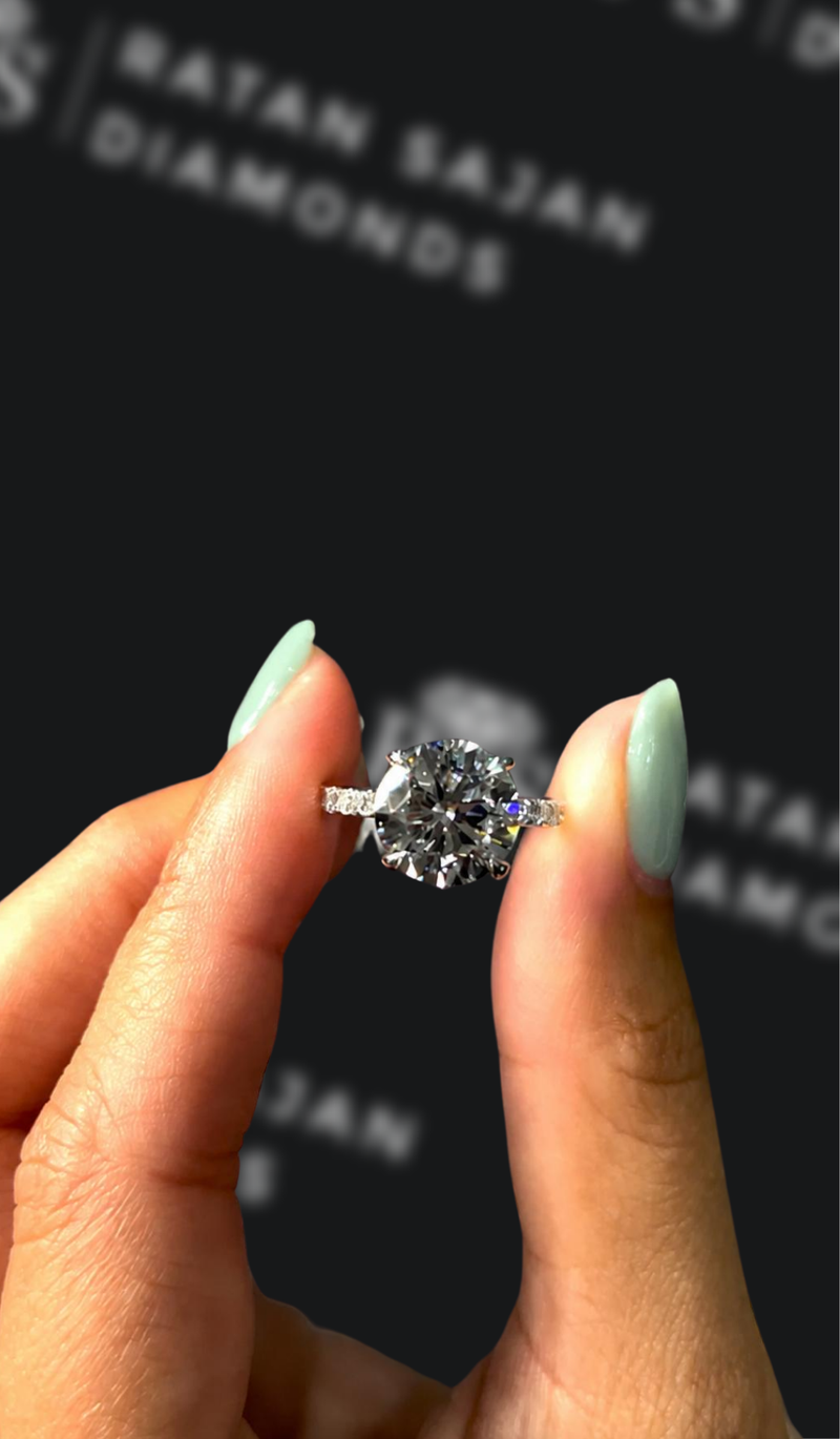 Three carat round brilliant natural diamond band engagement ring