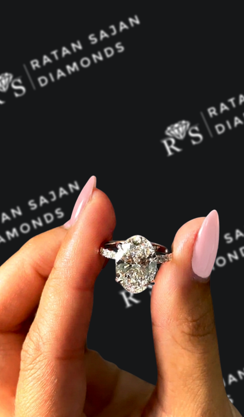 Three carat oval natural diamond band engagement ring