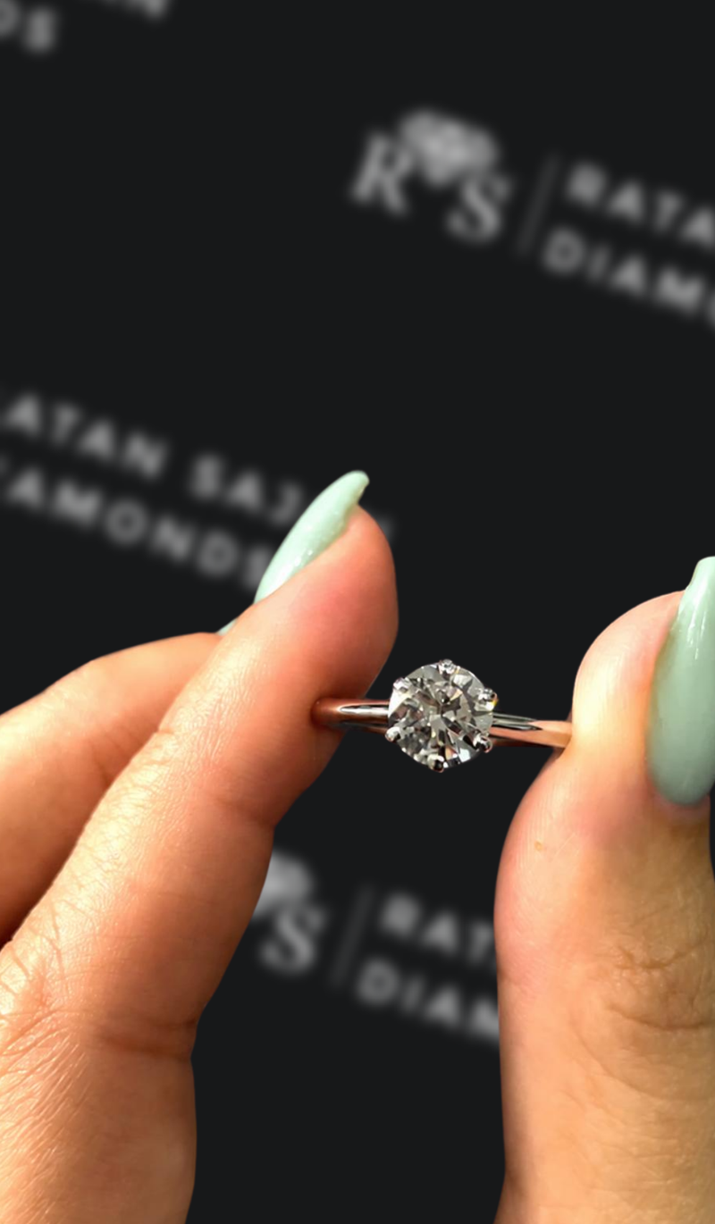 One carat round brilliant natural diamond solitaire engagement ring
