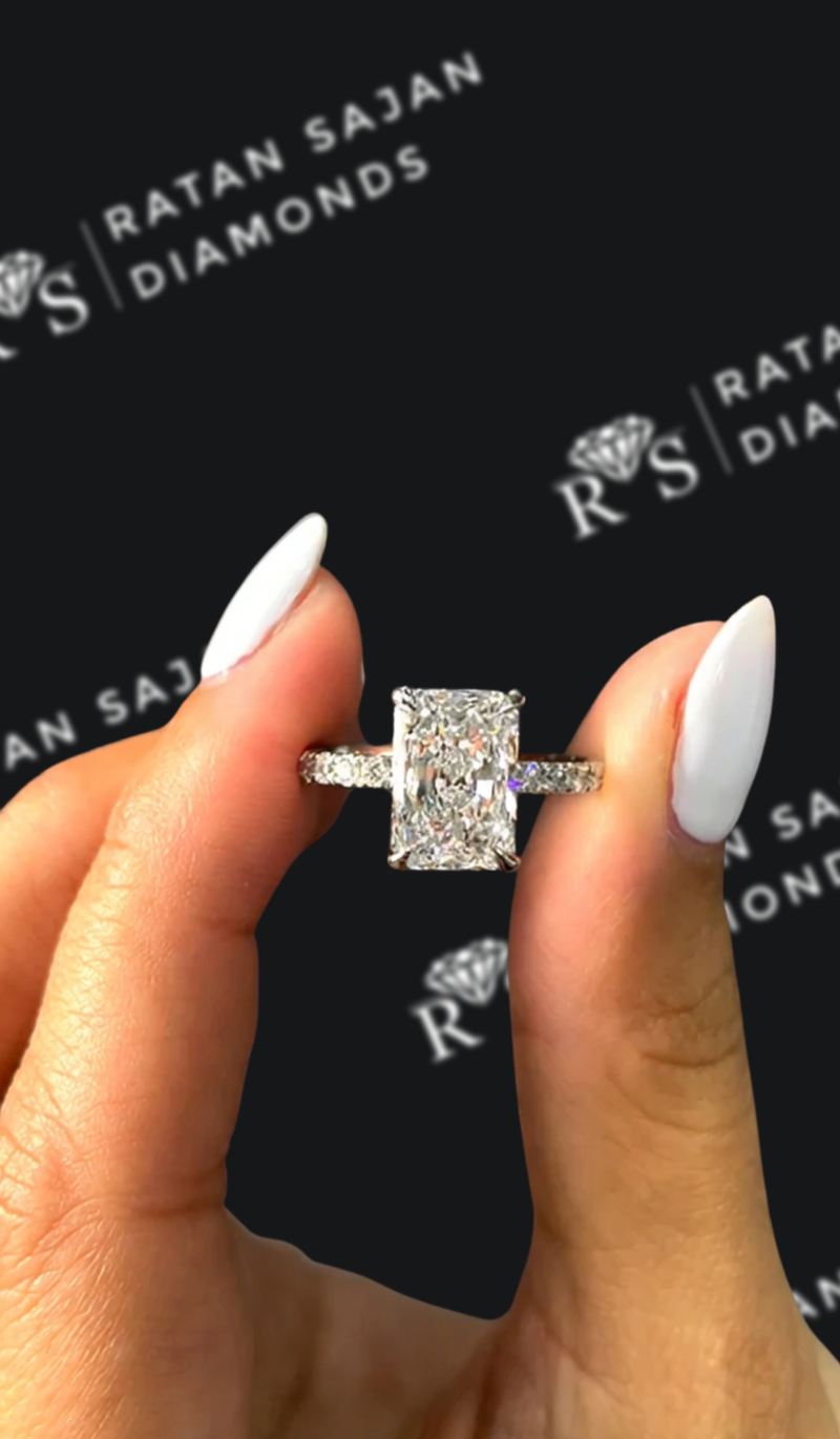 Two-and-a-half carat radiant cut natural diamond band engagement ring
