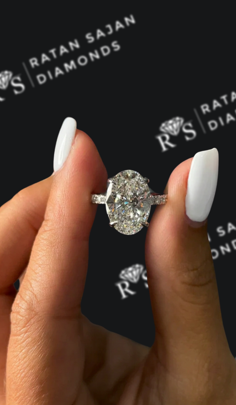 3.5 carat oval natural diamond band engagement ring in 18K white gold