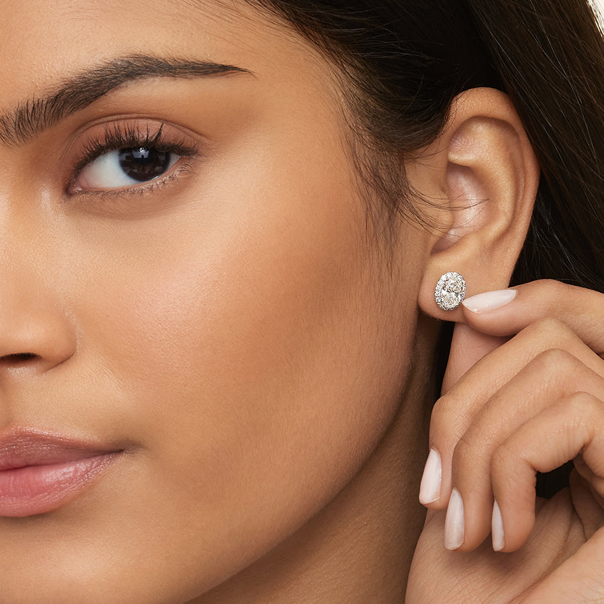 Oval Cut Natural Diamond Diamond Halo Stud Earrings