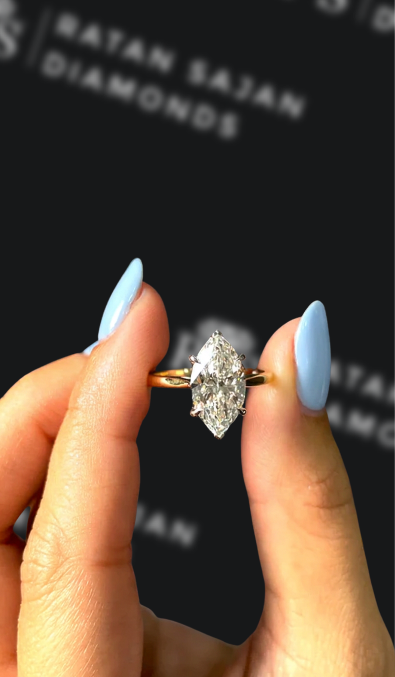 Two-and-a-half carat marquise natural diamond solitaire engagement ring