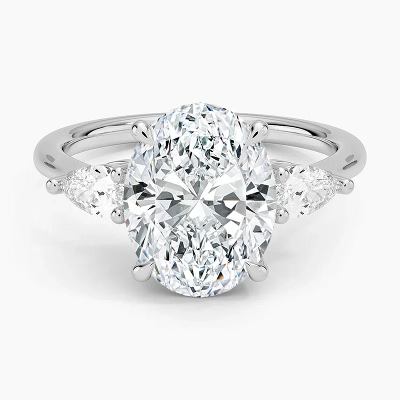 3 carat oval natural diamond pear trilogy engagement ring for comparison