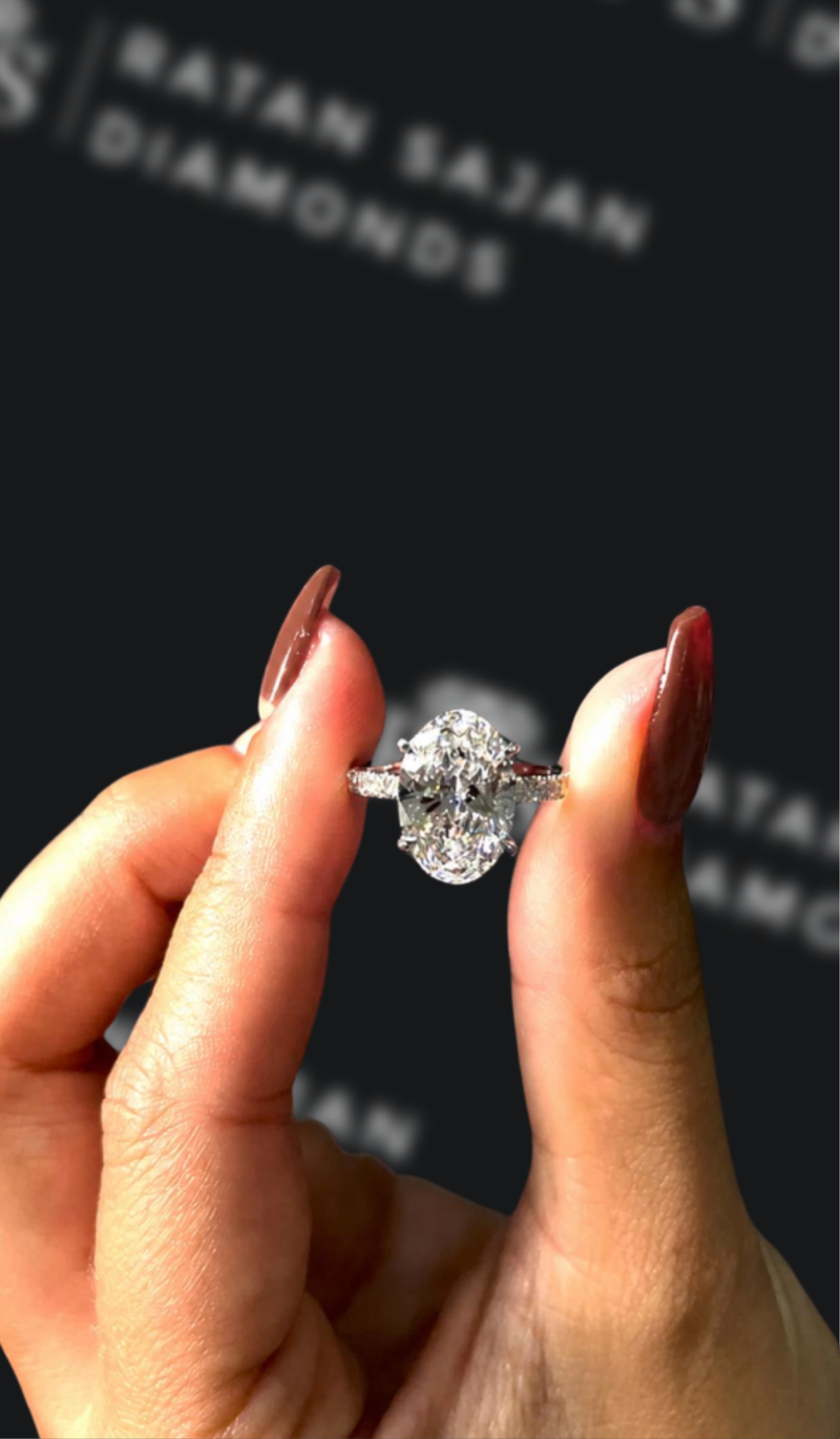 Four carat round brilliant natural diamond band engagement ring