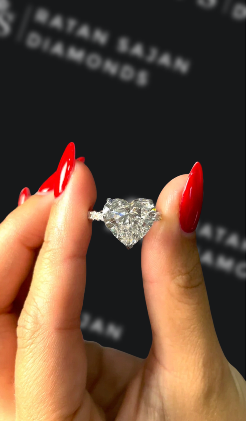 Five carat heart shaped natural diamond band engagement ring