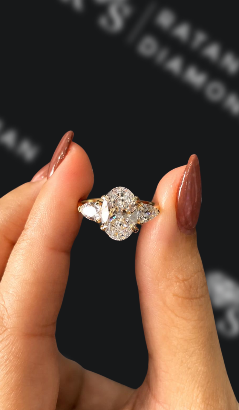 Four carat round brilliant natural diamond solitaire engagement ring