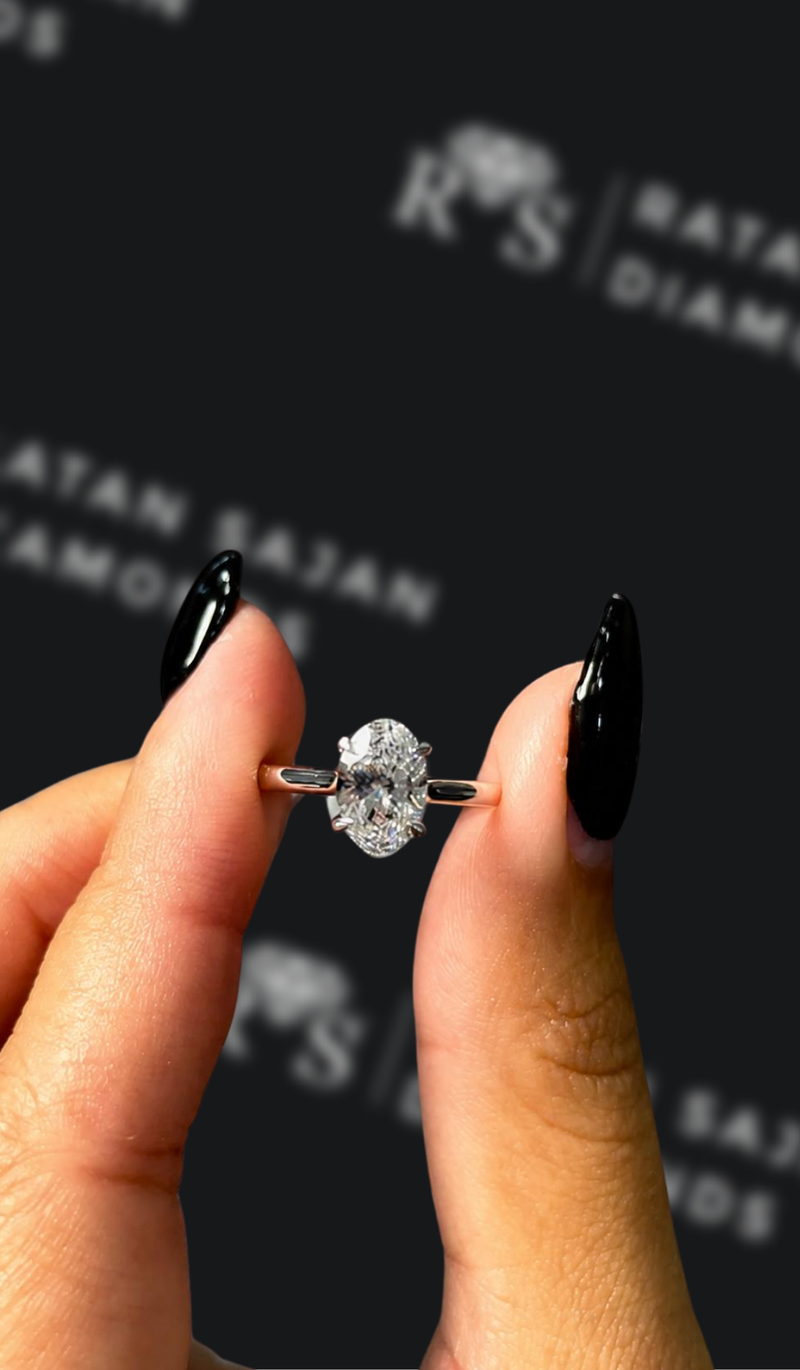 One carat oval natural diamond solitaire engagement ring