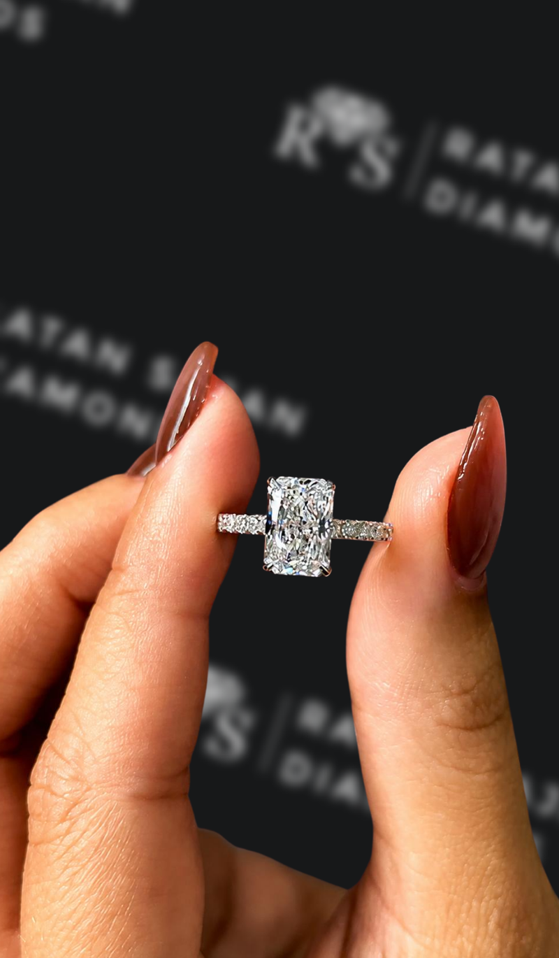 One-and-a-half carat radiant cut natural diamond band engagement ring