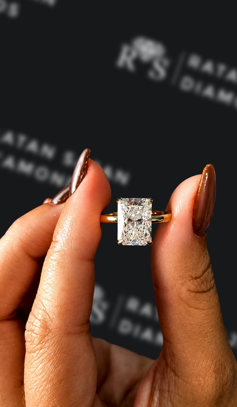 Four carat radiant cut natural diamond solitaire engagement ring