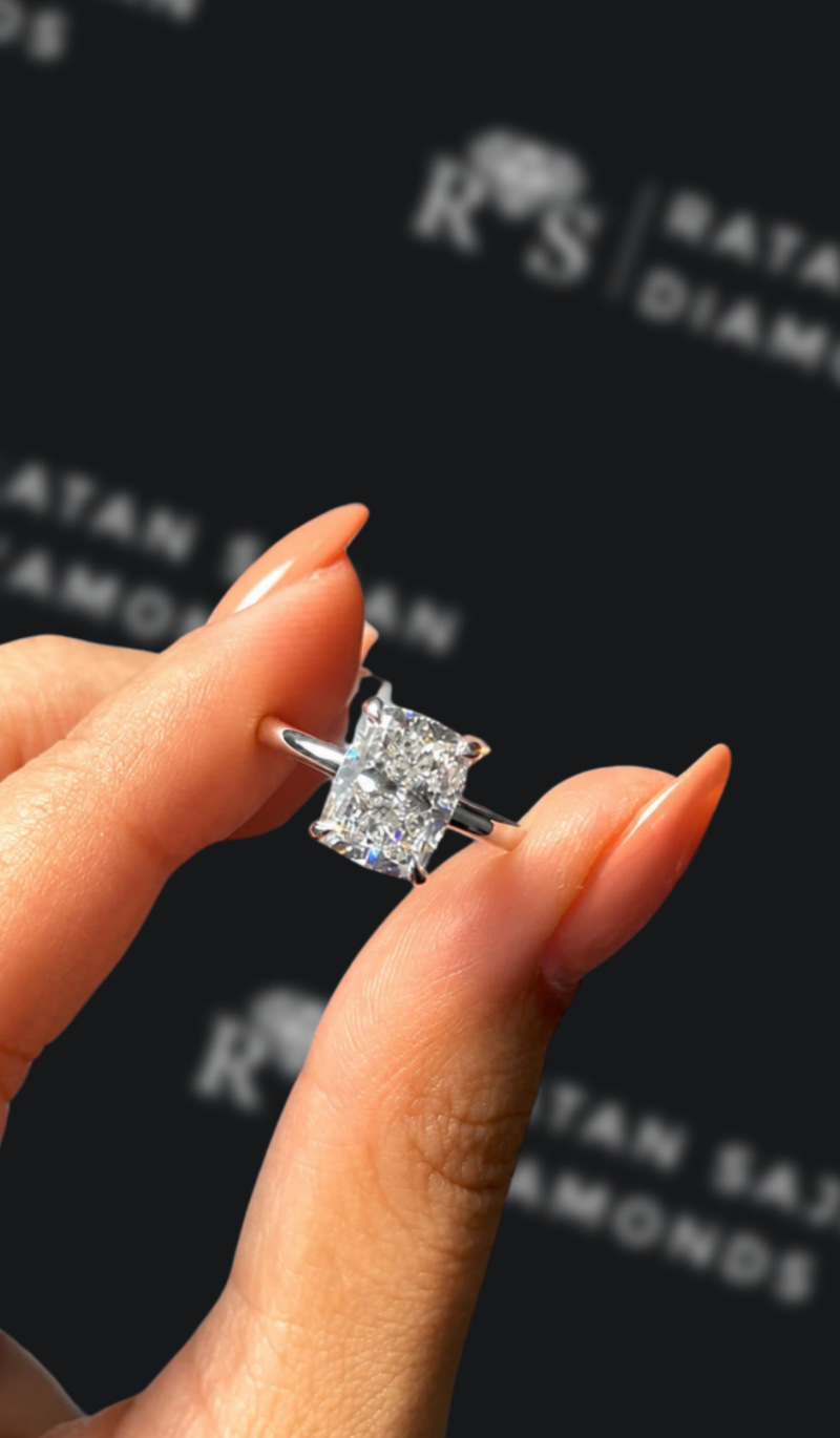 Two-and-a-half carat cushion cut natural diamond solitaire engagement ring